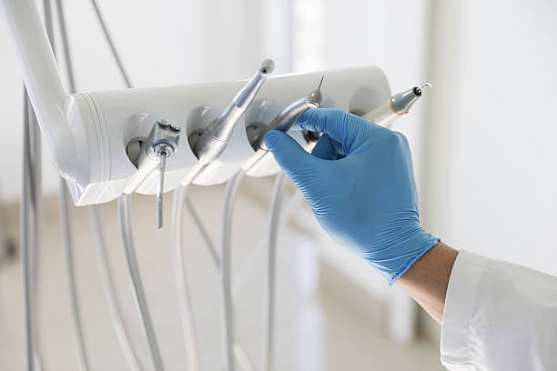 Professional Tooth Extraction technician working in Edinburg, VA